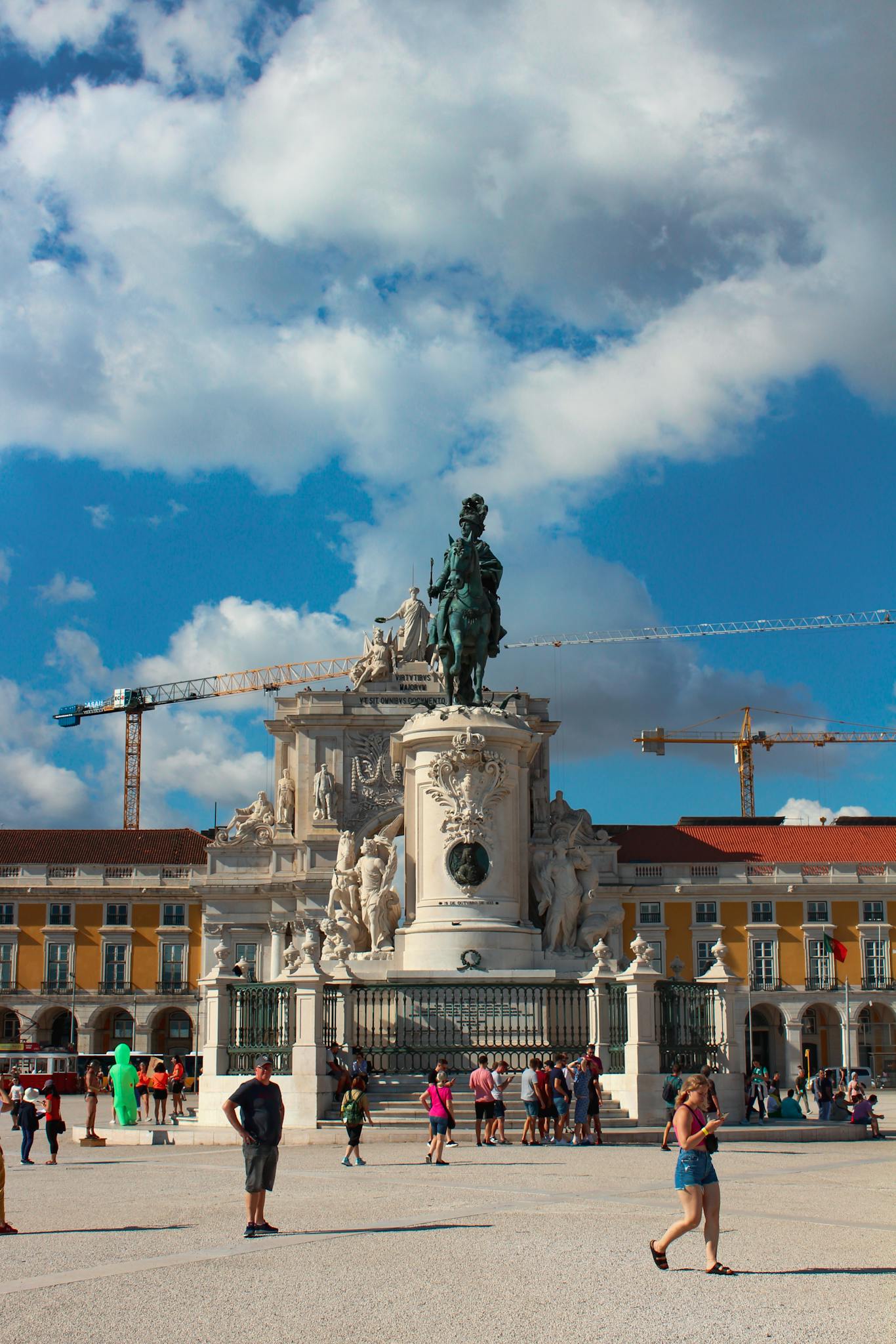 Vibrant day at Praça do Comércio in Lisbon featuring the iconic Statue of Joseph I.